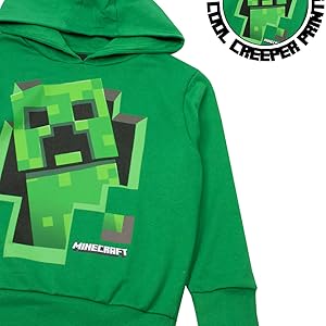 Close up of print and sleeve on Minecraft Creeper inside green hoodie