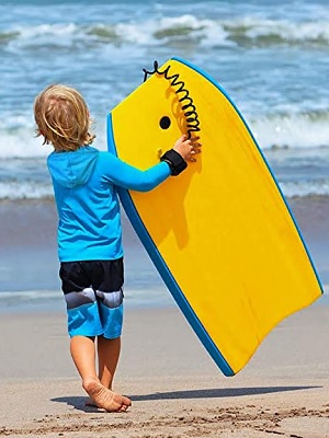 A boy with a surfing borad