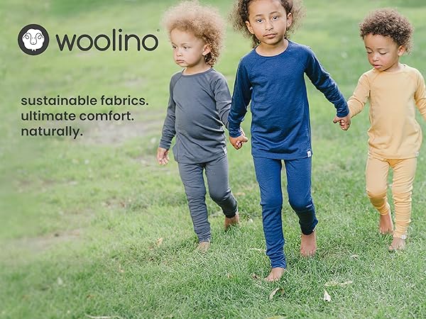 Kids holding hands wearing Woolino Merino Wool Thermal Base Layers.