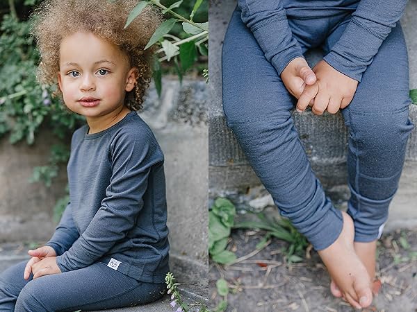 Child wearing a Woolino Kids Merino Wool Thermal Top and Legging in Charcoal gray.