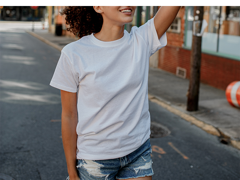 Woman in urban setting with Brisco t shirt