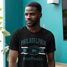 Man wearing Philadelphia Football shirt