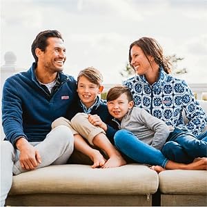 Family on a boat wearing Vineyard Vines