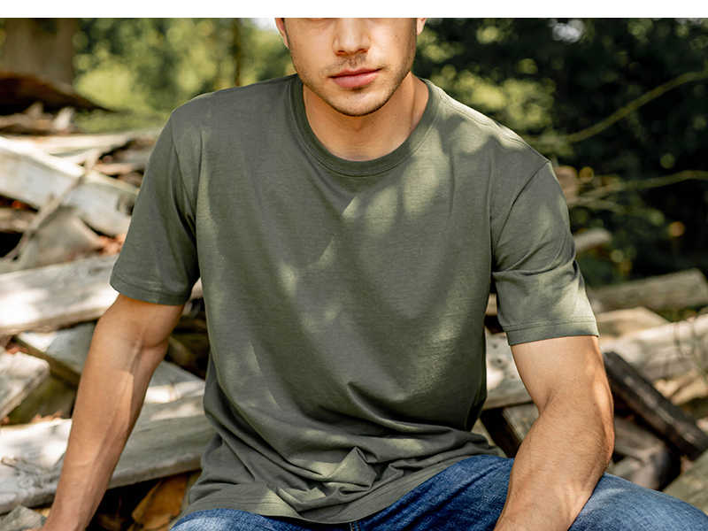 Male model wearing Brisco Brands t shirt